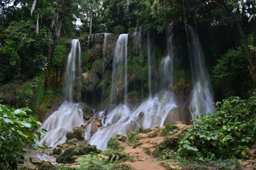 Waterfall in the green jungle in Cuba