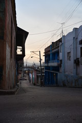 Fototapeta na wymiar Empty street in Cuba on a cloudy day