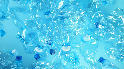 Pile of flying empty plastic bottles
