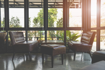 Interior design with luxurious vintage style sofa, armchair and table.with warm light.