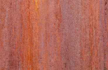 Textured red rust wall background, aged vintage surface, horizontal.