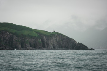 Scenic high rocks in the Pacific Ocean. Kamchatka Peninsula.