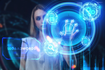 Obraz premium Business, Technology, Internet and network concept. Young businessman working on a virtual screen of the future and sees the inscription:
