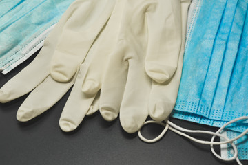 Medical masks and sterile gloves. Coronavirus protection concept. One of the ways to reduce the...