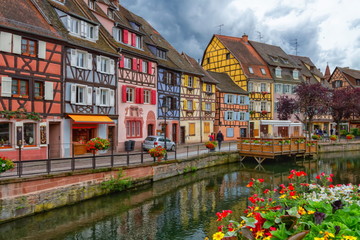 Colmar city, houses and canal by day, France - obrazy, fototapety, plakaty
