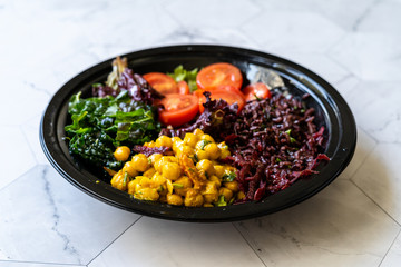 Turmeric Chickpea Salad with Black Rice, Kale, Cherry Tomatoes, Kale and Forbidden Rice.