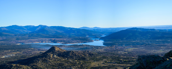 mountains landscape with rivers u sunny sky background