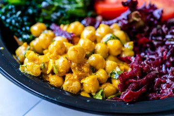 Turmeric Chickpea Salad with Black Rice, Kale, Cherry Tomatoes, Kale and Forbidden Rice.