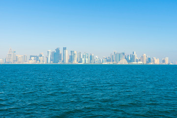 View of modern skyscrapers and bay in Doha, Qatar 