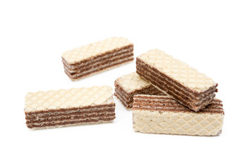 Crispy wafers with creamy hazelnut filling isolated on white background