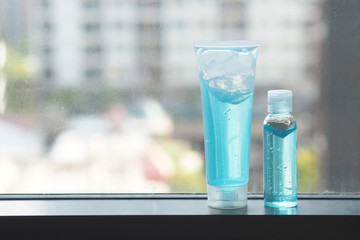 Blue Alcohol gel tube and bottle for Hand wash with copy space - Hygiene Concept