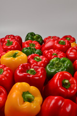 Fresh red, green, yellow bell pepper background.