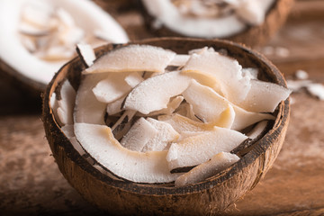 Shaved Coconut into a coconut bowl.