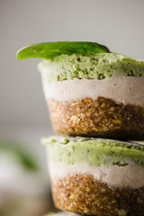 Close-up of healthy lactose and glutenfree coconut avocado spinach bites cakes