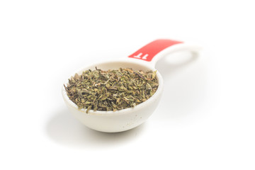 Dried Oregano into a Tablespoon.