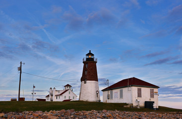 Point Judith Lighthouse after sunset at Narragansett RI, USA. The lighthouse  is located on the west side of the entrance to Narragansett Bay.