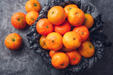 Tangerine basket close-up. Top view