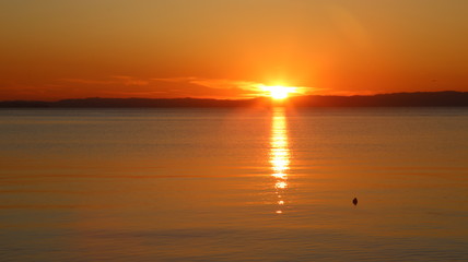 Obraz premium Sunset at the Garda lake - Italy
