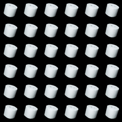 toilet paper on black background. Symbol image for corona crisis panic buying / hoarding, with copy space. seamless pattern.