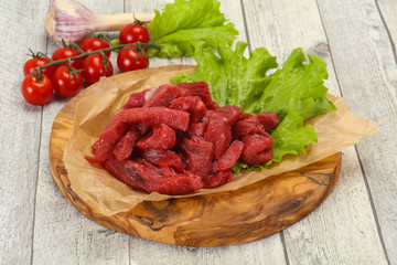Raw beef meat sliced for cooking