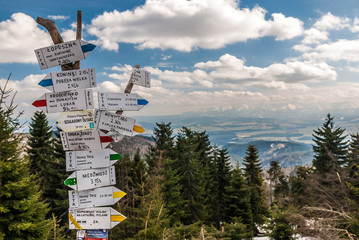 Gorce Mountains signpost in spring - Tatry mountains view from Turbacz, Gorce Mountains,...