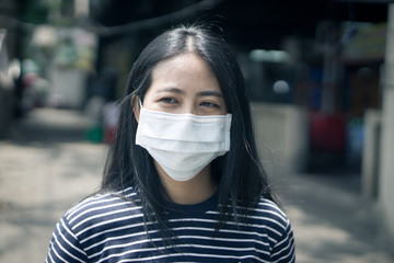 Asian woman wear protective face mask., with copy space