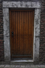 old wooden door in wall