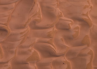 Sand pattern at the bottom of a dry river bed