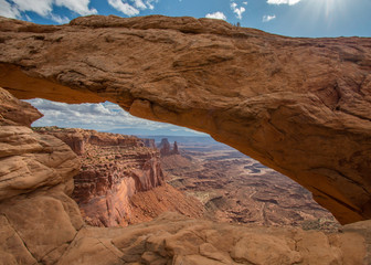 Clouds in the sky above Mesa Arch in Canyonlands National Park near Moab, Utah