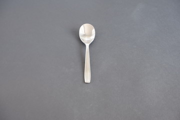 Kitchen utensils on a dark background on the table