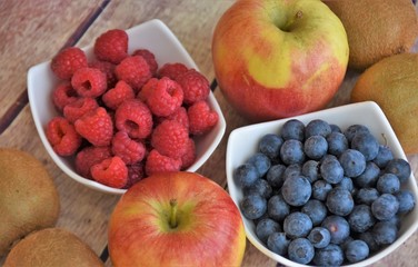 Fototapeta na wymiar fresh berries, raspberries, blueberries and apples