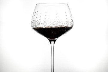 red wine pouring into glass