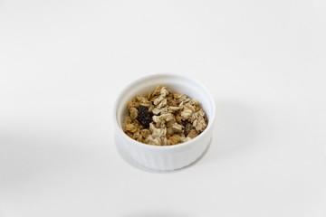 corn flakes in a bowl isolated on white background