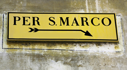 Road sign in Venice with directions to Saint Mark