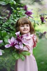 little girl in the garden