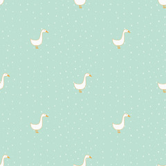 Seamless pattern. White cartoon geese on a turquoise background with dots.