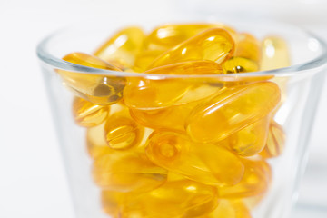 dietary supplement - fish oil capsules, closeup