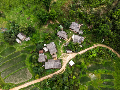 Aerial photo of a small village in the middle of the jungle in northern Thailand