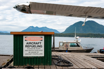 boat and sea plane gas station on the pier