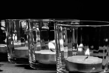 burning candle light flame in votive