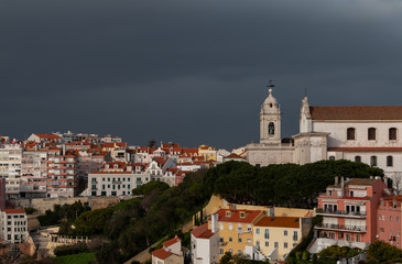 Fototapeta premium Scenic view over the red rooftops of Lisbon, Portugal.