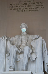 Abraham Lincoln Memorial with a surgical face mask as a symbol of the coronavirus global outbreak