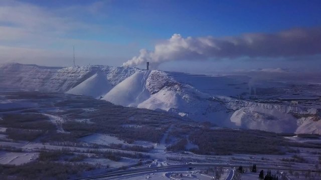 Aerial winter sunny view of Kiruna, the northernmost town in Sweden, province of Lapland, Norrbotten County, footage shot from drone