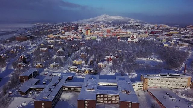 Aerial winter sunny view of Kiruna, the northernmost town in Sweden, province of Lapland, Norrbotten County, footage shot from drone