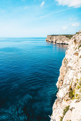 Fototapeta premium Barcos en Menorca mar mediterraneo verano islas baleares y mar azul turquesa