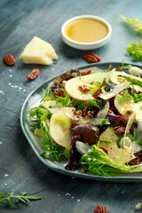 Vegetarian Fennel and apple salad with pecan nuts and Pecorino romano cheese shavings