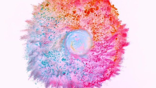 Super slow motion of coloured powder rotation isolated on white background. Filmed on high speed cinema camera, 1000fps.
