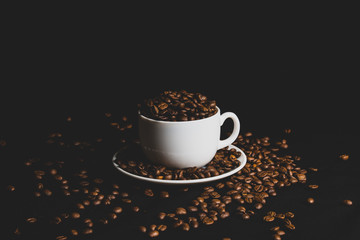 cup of coffee with beans
