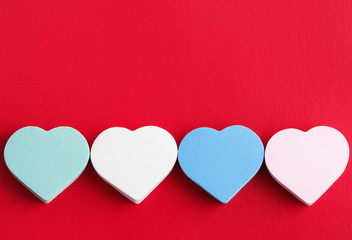 Heart-shaped cosmetic sponges. Skin care and beauty concept