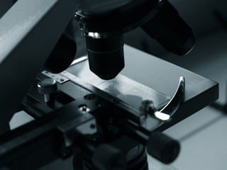 sciencie laboratory microscope macro detail monochrome image.